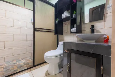 a bathroom with a toilet and a sink at Vacation Home Bartenderluisch in Fortuna