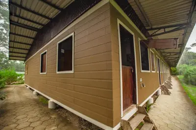 a house with awning on the side of it at Veragua Rainforest in Puerto Limón