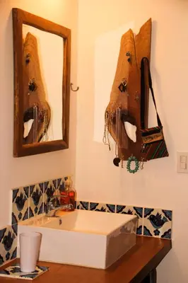 a bathroom with a sink and a mirror at Casa Por Fin in Monteverde Costa Rica