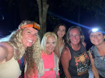 a group of women posing for a picture at a party at Mountain Top Park Hotel in Manuel Antonio