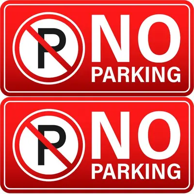 two red no parking signs with the words no parking at 0201 iFreses Hermoso Apartamento Full Equipado SIN PARQUEO in Curridabat