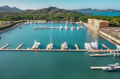 an aerial view of a marina with boats docked at 360 Splendor - Ocean-View Condo #204 in Luxury Flamingo-Complex in Playa Flamingo