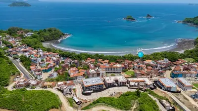 an aerial view of a town next to the beach at Casa Cazenovia - 3BR home, astonishing rooftop terrace in Las Catalinas in Playa Danta
