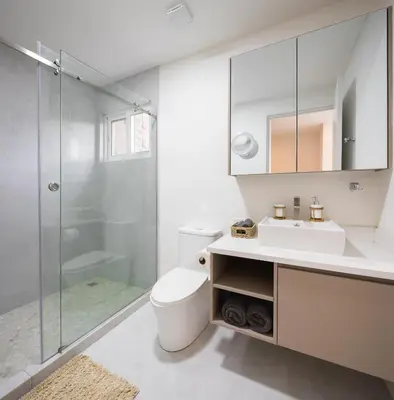 a bathroom with a toilet and a sink and a shower at AYLA C - new, cozy Ocean view Studio in Flamingo in Playa Flamingo