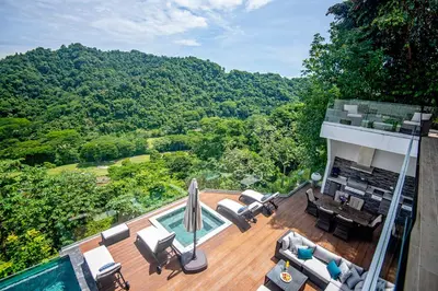 an overhead view of a deck with a swimming pool and trees at Casa Mar CR in Herradura
