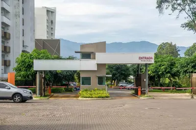 a car parked in front of a gas station at Luxury NEW Apt -24/7 sec- 10 min from SJO Airport in Heredia