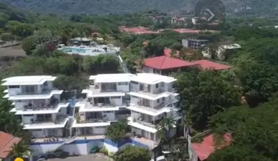 an aerial view of a large white building at Buena Vista Coco in Coco