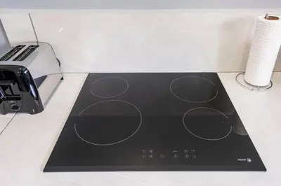 a close up of a cutting board with a printer at Villas Anna Bertha 2 noches minimo in San Isidro