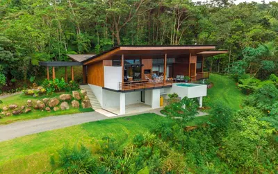an overhead view of a house in the woods at Villa Morpho - Luxury Jungle House at Ecolirios Green Community in Guácimo