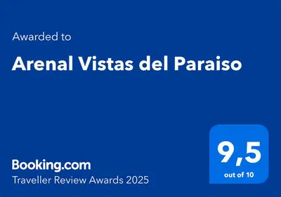 a blue sign with the words annual vista del panismo at Arenal Vistas del Paraiso in Nuevo Arenal