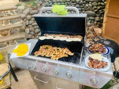 a grill with a bunch of food on it at Hotel Vista Bonita in Parrita