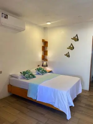 a bedroom with a bed in a room at Legoon View in Tortuguero