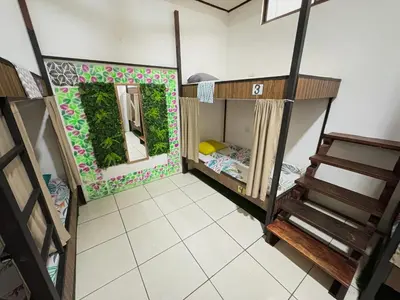 an overhead view of a room with bunk beds at Cheap Hostel Quepos in Quepos