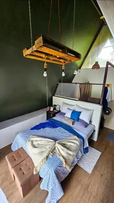 a bedroom with a bed in a tent at Flora Glamping de Abuela in Fortuna