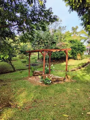a wooden structure sitting on top of a tree stump at Cabaña Campo Verde in Marsella