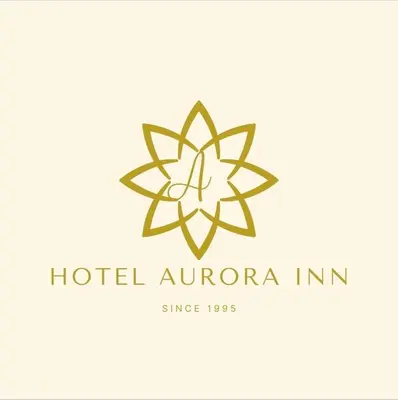 a logo for a hotel aurora inn at Hotel Aurora Inn, Nuevo Arenal in Nuevo Arenal