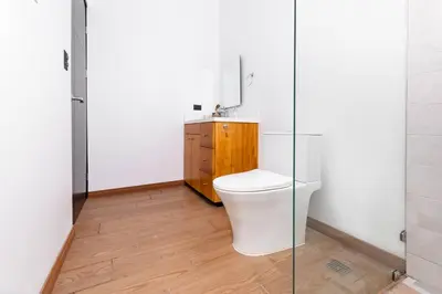 a bathroom with a toilet and a sink at Casa Coral - great location - high speed internet in Uvita