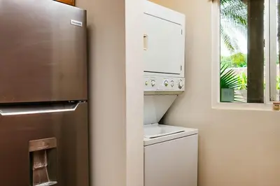 a kitchen with a refrigerator and a microwave at 1-BD Near Beach Great for Digital Nomads in Potrero