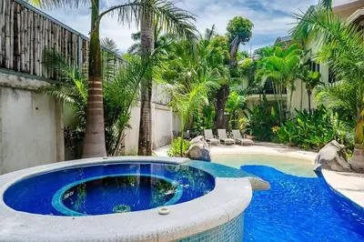 a swimming pool with a large blue pool at 1-BD Near Beach Great for Digital Nomads in Potrero