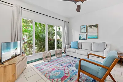 a living room with a couch and a tv at 1-BD Near Beach Great for Digital Nomads in Potrero