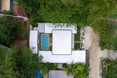 an aerial view of a house with a pool at Modern Garden Villa with Private Pool, Outdoor Kitchen & Separate Casita Near Playa Potrero in Potrero