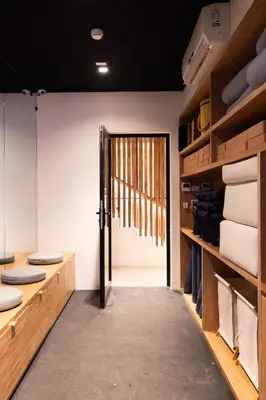 a room with a door leading into a room with towels at Silvestre Nosara Hotel & Residences in Nosara