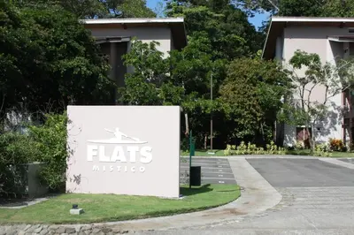 a sign for a flats museum on the side of a road at Playa Hermosa, Mistico, Surf, Bike, Hike, 4 Hab, Lagos, Familia in Jacó
