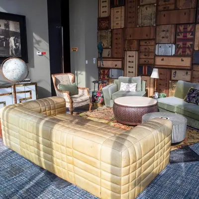 a living room with a large couch and chairs at 906A URBN Barrio Escalante Estudio con A/C y Parqueo in San José