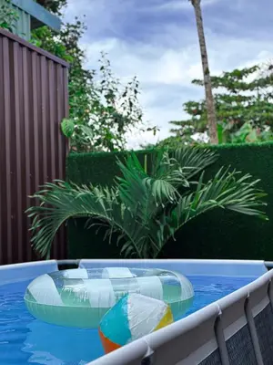 a table with twoogie boards on top of the water at Villa El Bosque Dorado in Fortuna