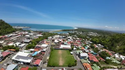 an aerial view of a town next to the ocean at Casa Bella Vista in Quepos