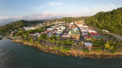 an aerial view of a town next to the water at Casa Bella Vista in Quepos