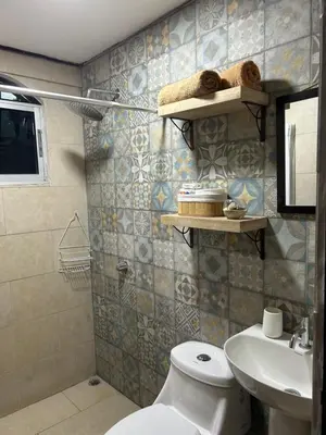 a bathroom with a toilet and a sink at SilvaMar in Puntarenas