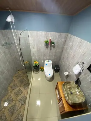 a bathroom with a sink and a toilet and a shower at Casa Sios San Luis, Monteverde in Monteverde Costa Rica