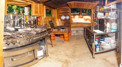a kitchen with a sink and a stove at Casa Rancho Verde in Monterrey