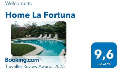 a screenshot of a website with a picture of a pool at Home La Fortuna in Fortuna