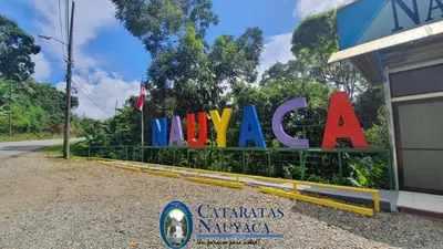 a sign for a hyundai dealership in front of a building at Modern Mountain View Home by Nauyaca Waterfall in Platanillo