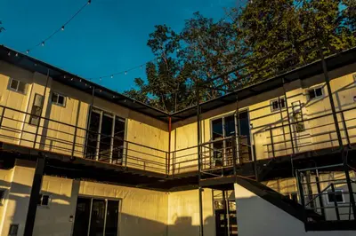 a building with balconies on the side of it at Emi’s Place Container Living in Uvita