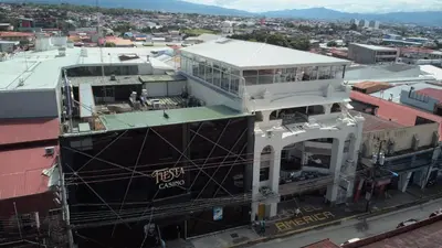 an aerial view of a building in a city at Hotel América Heredia in Heredia