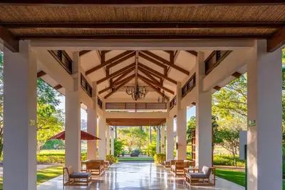 a large pavilion with chairs and a chandelier at Serene 3BR Condo - Bougainvillea - Reserva Conchal Golf Resort in Playa Conchal