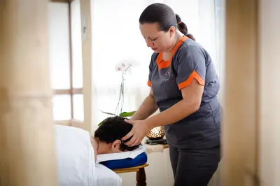 a nurse standing next to a patient in a hospital room at Hotel Arenas en Punta Leona in Jacó
