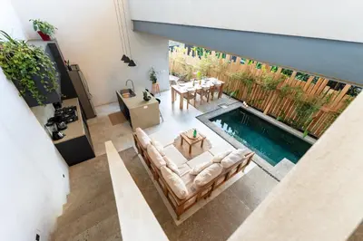 an overhead view of a living room with a swimming pool at Alma Tropical - Luxury Villa Experience in Santa Teresa in Santa Teresa Beach