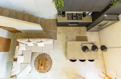 an overhead view of a living room with a stove at Alma Tropical - Luxury Villa Experience in Santa Teresa in Santa Teresa Beach