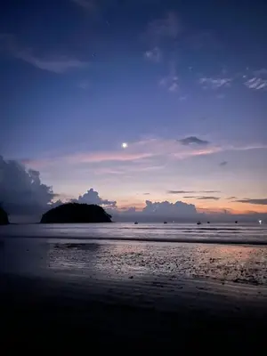 a view of the beach at sunset at Surf House in Sámara