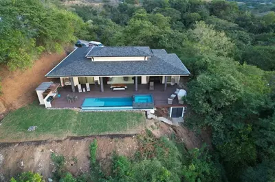 an aerial view of a house on a cliff at Casa Mon Coeur-Playa Del Coco Ocean View in Coco