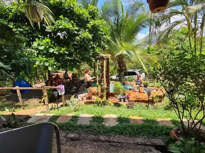 a group of people sitting in a garden at Casa de campo rodeada de naturaleza in San Francisco