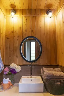 a bathroom with a sink and a mirror at La Casona de Los Santos in Cedral