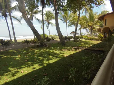 a view of the beach from the house at Hotel Delfin Playa Bejuco in Esterillos Este