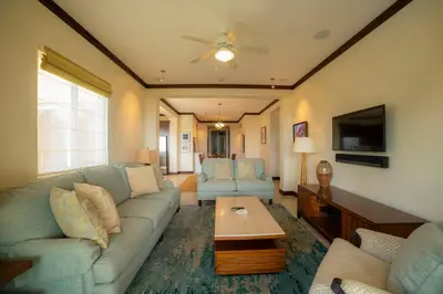 a living room with a couch and a table at AltaVista 2C 3 bdr Ocean View in Los Suenos in Herradura