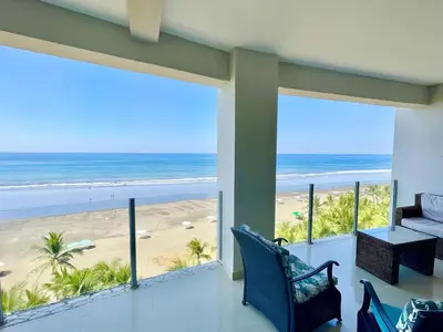 a living room with a view of the beach at Ocean View, Luxury Penthouse at Diamonte del Sol 702N in Jacó
