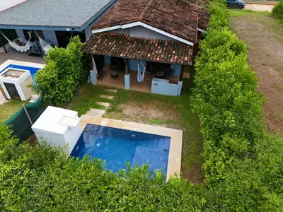 an overhead view of a house with a swimming pool at Casa Aqua in Tamarindo